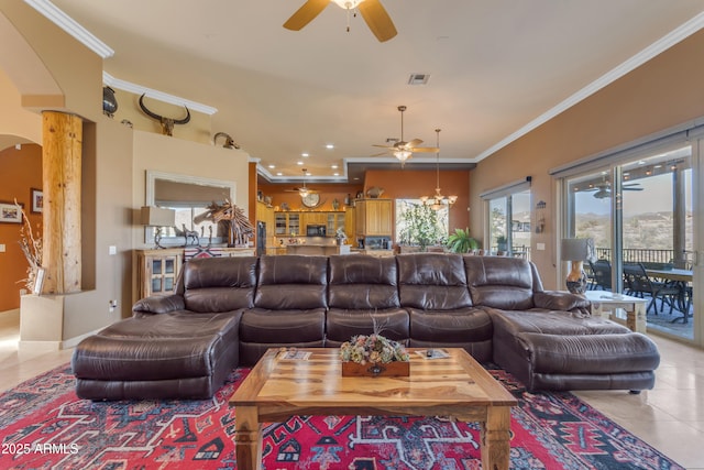 tiled living room featuring visible vents, recessed lighting, arched walkways, crown molding, and ceiling fan with notable chandelier