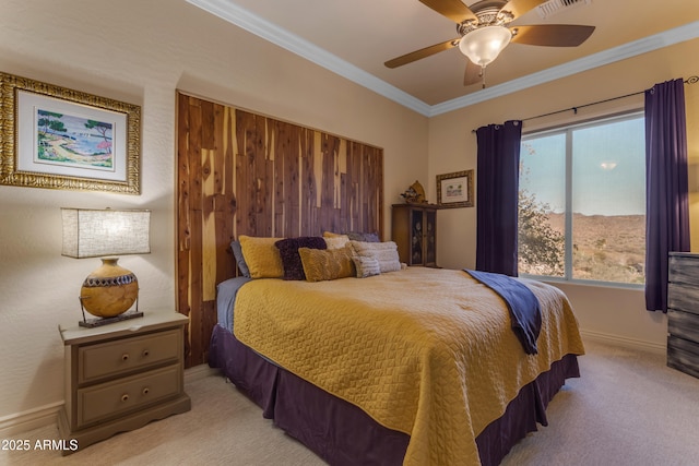 bedroom with ceiling fan, crown molding, baseboards, and light carpet