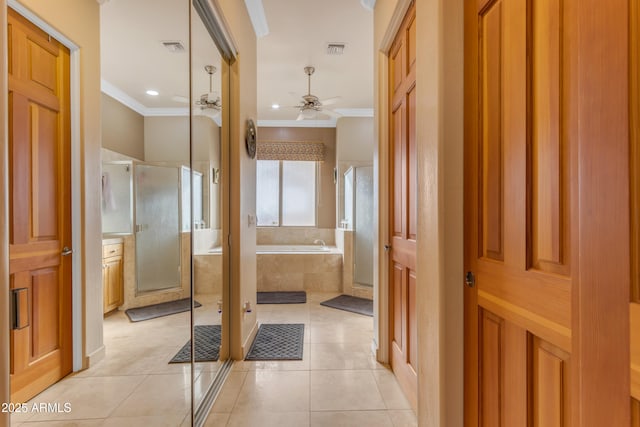 bathroom featuring visible vents, a stall shower, ornamental molding, tile patterned floors, and a bath