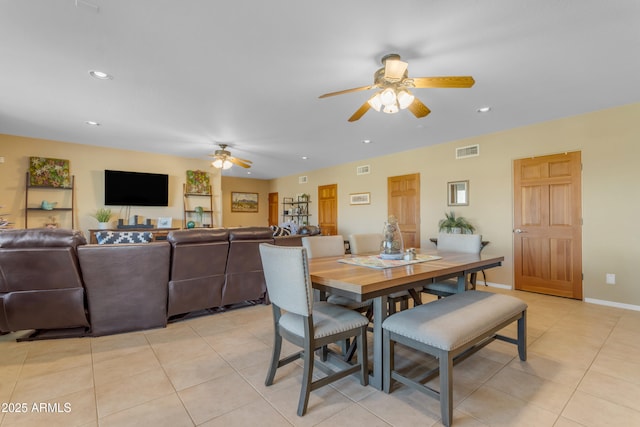 dining space with light tile patterned floors, visible vents, recessed lighting, and baseboards