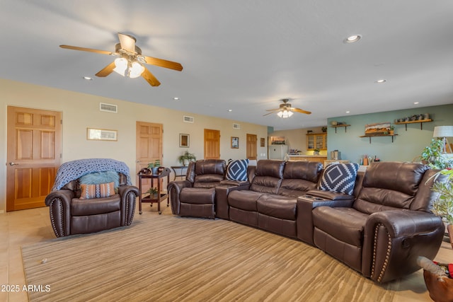 living area featuring visible vents, recessed lighting, and ceiling fan