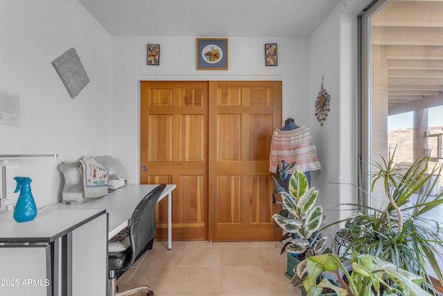 office space featuring light tile patterned floors