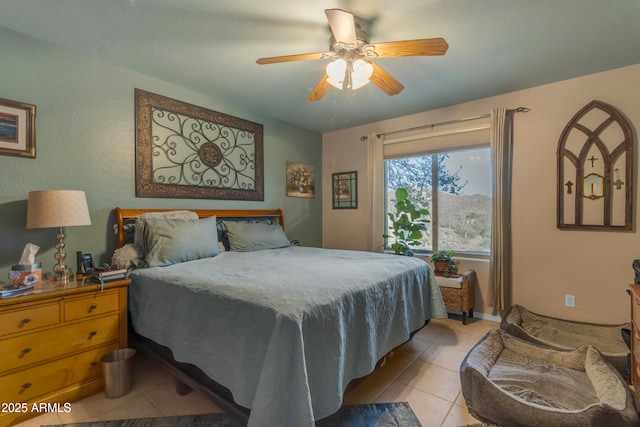 bedroom featuring light tile patterned flooring and ceiling fan