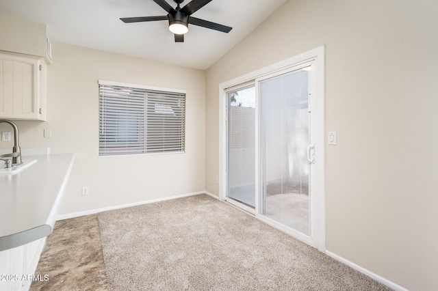 3324 S Parkside Dr, Tempe, AZ 85282 - unfurnished dining area featuring light colored carpet, ceiling fan, and lofted ceiling