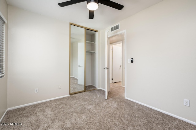 3324 S Parkside Dr, Tempe, AZ 85282 - unfurnished bedroom featuring carpet floors, a closet, and a ceiling fan