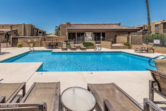3825 E Camelback Rd Unit 152, Phoenix, AZ 85018 - community pool featuring a patio area