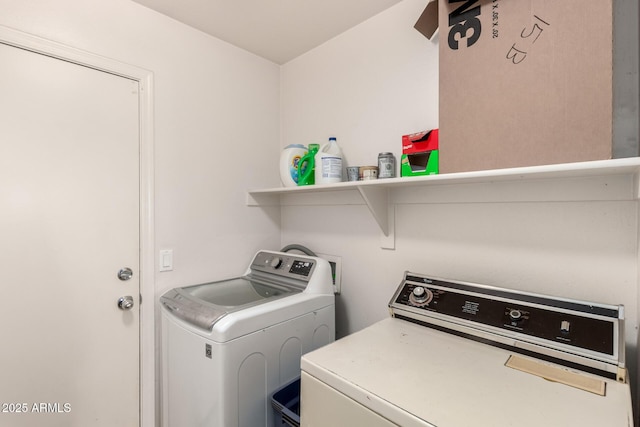 washroom with laundry area and washing machine and clothes dryer