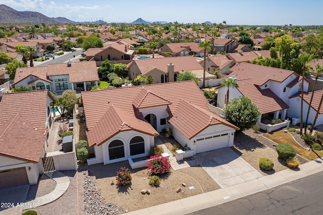 birds eye view of property featuring a residential view and a mountain view