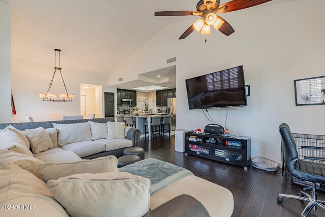 dining room featuring hardwood / wood-style floors, plenty of natural light, and lofted ceiling