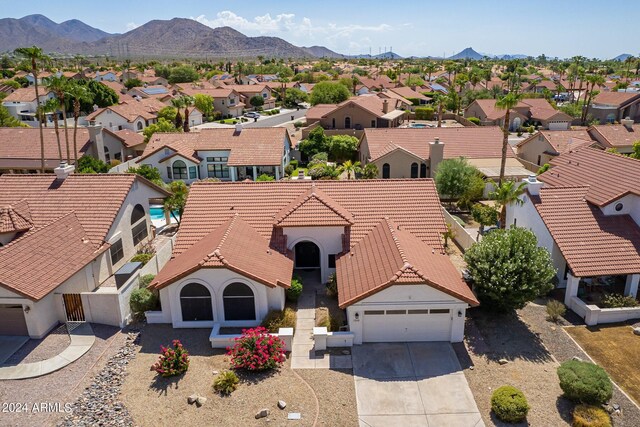 drone / aerial view featuring a mountain view