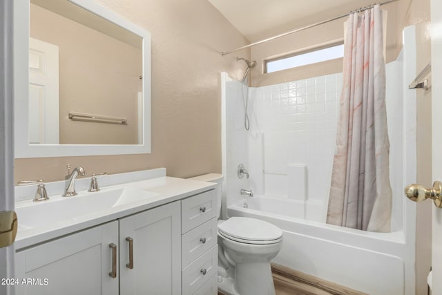 full bathroom with toilet, vanity, and shower / bath combination with curtain