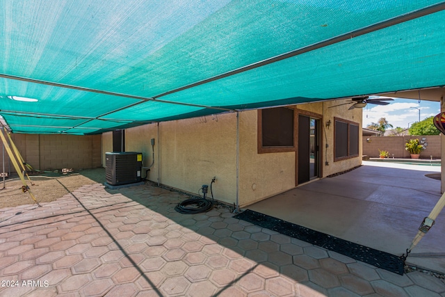 view of patio with ceiling fan and central air condition unit