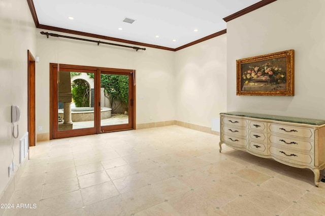 spare room featuring ornamental molding