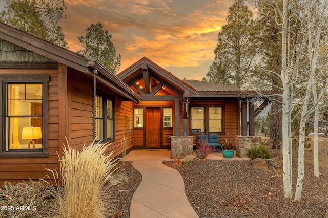 rustic home featuring a porch