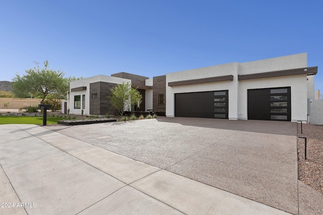 modern home featuring a garage