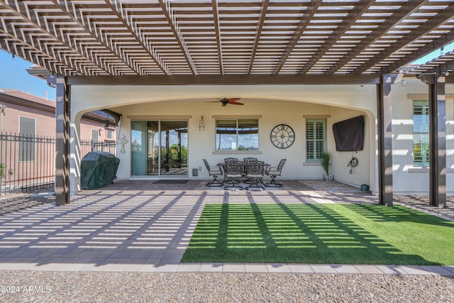 view of patio featuring a pergola and ceiling fan