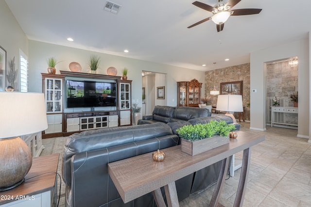 living room with ceiling fan