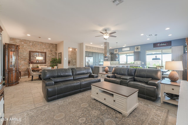 living room featuring ceiling fan