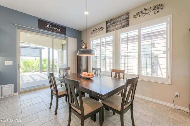 dining area featuring plenty of natural light