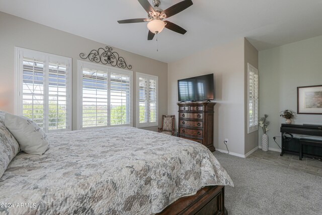 bedroom featuring ceiling fan and carpet floors