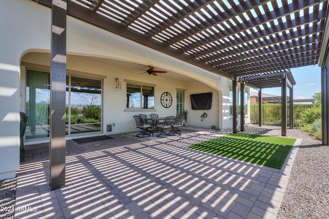 view of patio featuring a pergola and ceiling fan