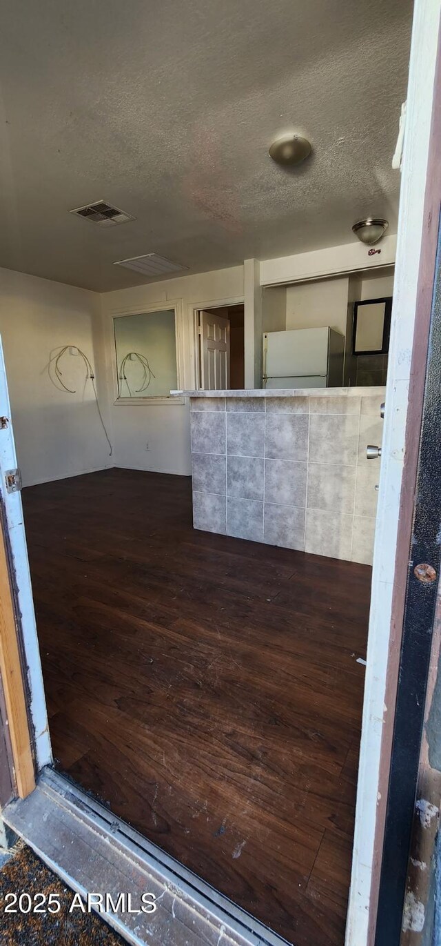 417 N 18th Dr, Phoenix, AZ 85007 - interior space with a textured ceiling and wood finished floors
