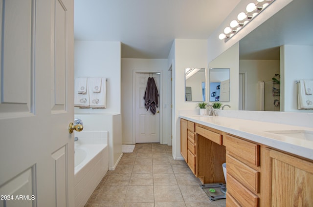 bathroom featuring tile patterned floors, plus walk in shower, and vanity