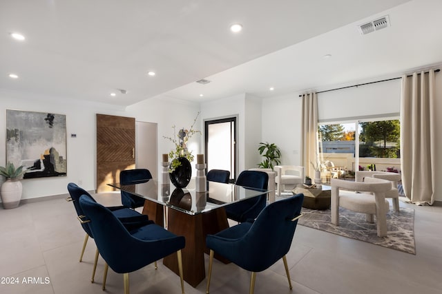 dining room with crown molding