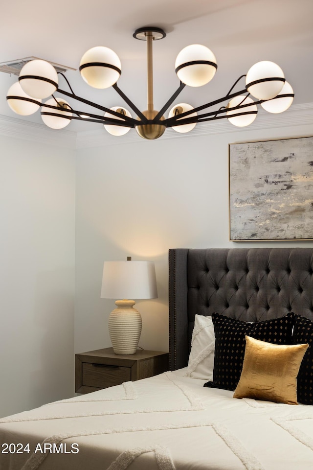 unfurnished bedroom featuring a notable chandelier