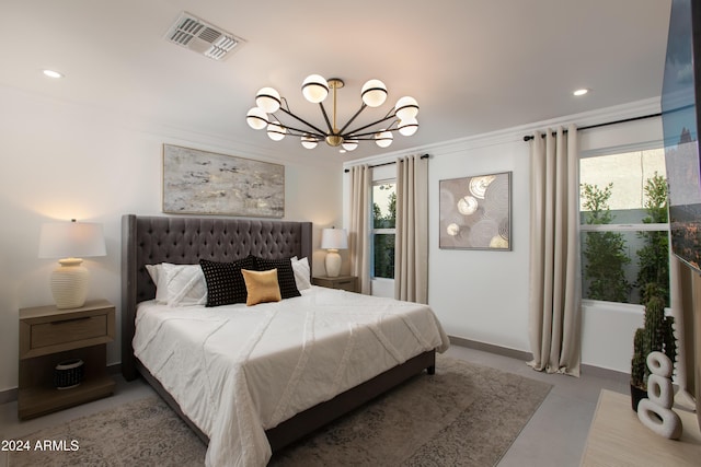 bedroom featuring a chandelier and crown molding