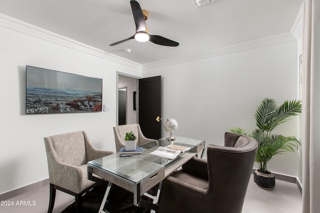 dining room featuring ceiling fan and crown molding