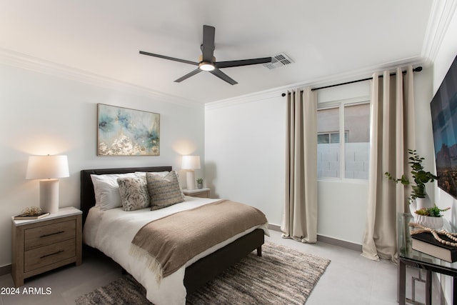 bedroom with ceiling fan and crown molding