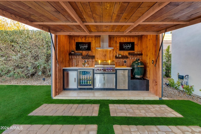 view of patio / terrace featuring a grill and exterior kitchen