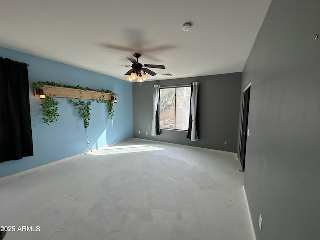 unfurnished room with ceiling fan