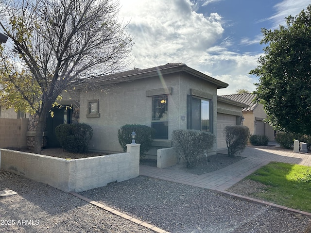 view of front of home featuring a garage