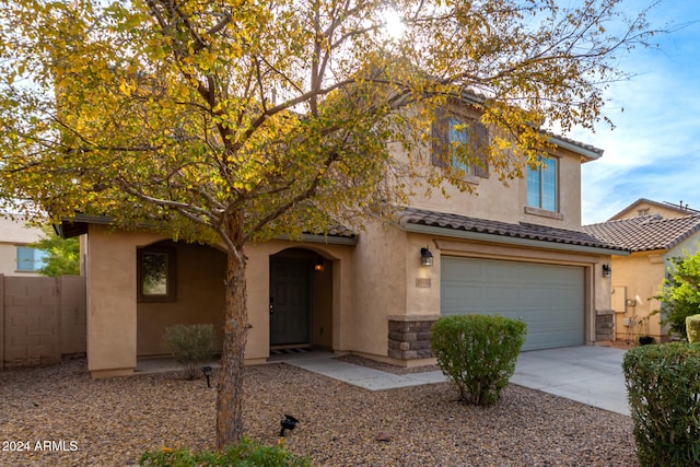 view of front of property featuring a garage