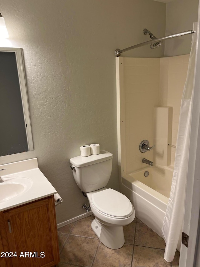 bathroom with toilet, tile patterned flooring, shower / bath combination with curtain, and vanity