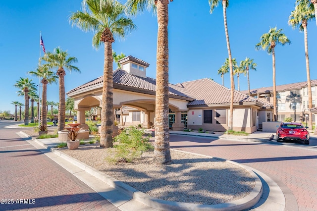 14950 W Mountain View Blvd Unit 5303, Surprise, AZ 85374 - view of front of home with stucco siding and a tiled roof