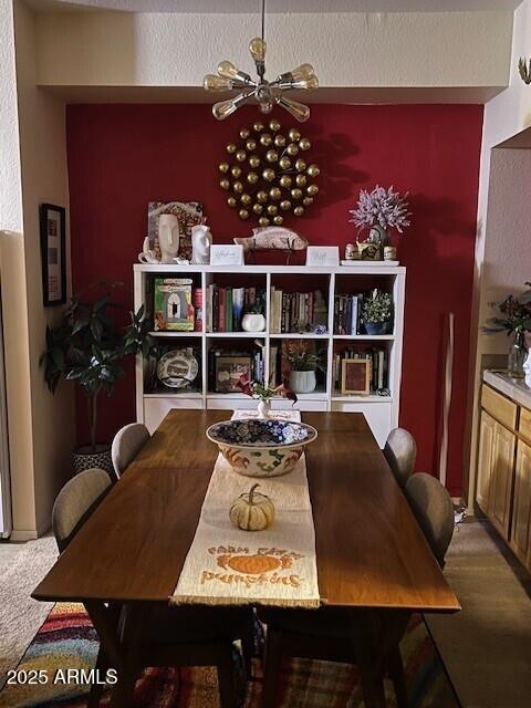 14950 W Mountain View Blvd Unit 5303, Surprise, AZ 85374 - dining space featuring a chandelier