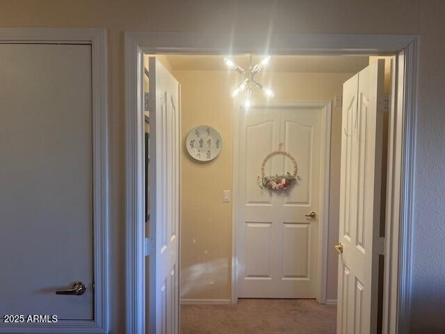 14950 W Mountain View Blvd Unit 5303, Surprise, AZ 85374 - hall featuring light colored carpet and baseboards