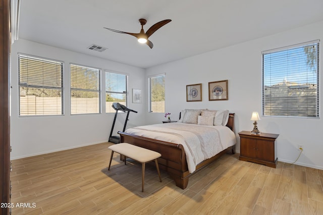 bedroom featuring ceiling fan and light hardwood / wood-style flooring