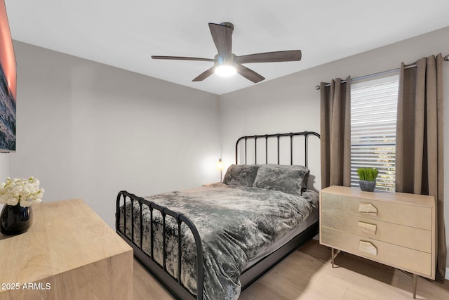 21640 N 48th St, Phoenix, AZ 85054 - bedroom with ceiling fan and wood finished floors
