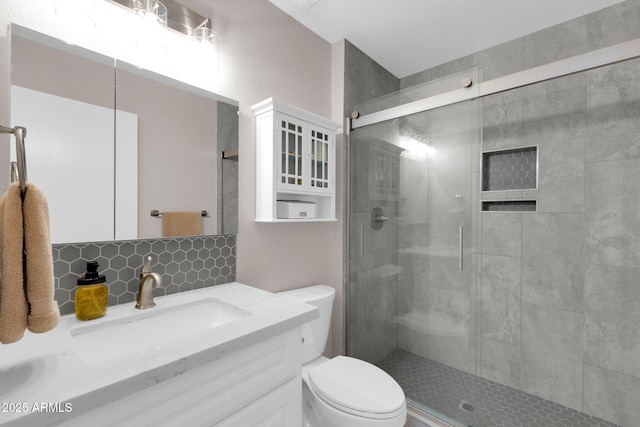 21640 N 48th St, Phoenix, AZ 85054 - full bathroom with tasteful backsplash, a stall shower, vanity, and toilet