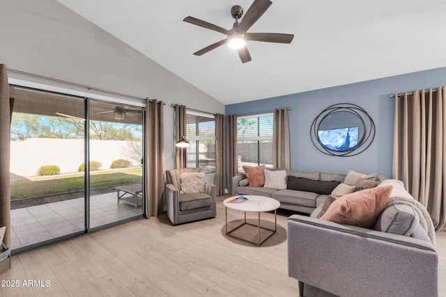 21640 N 48th St, Phoenix, AZ 85054 - living area with high vaulted ceiling, light wood finished floors, and a ceiling fan
