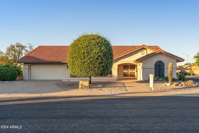 view of front of property featuring a garage