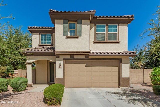 263 N Wilson Dr, Chandler, AZ 85225 - mediterranean / spanish-style home with a garage, driveway, stucco siding, and a tiled roof