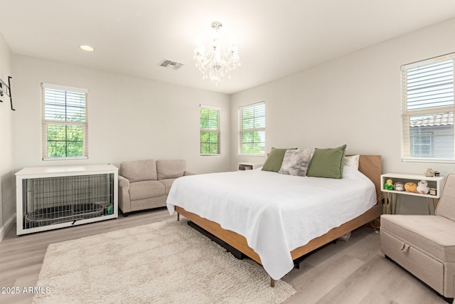 263 N Wilson Dr, Chandler, AZ 85225 - bedroom with wood finished floors, a chandelier, and recessed lighting