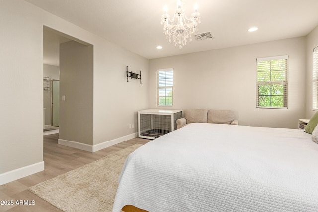 263 N Wilson Dr, Chandler, AZ 85225 - bedroom with light wood-style flooring, multiple windows, recessed lighting, and a chandelier