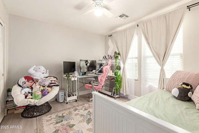 263 N Wilson Dr, Chandler, AZ 85225 - bedroom featuring light wood-style floors and a ceiling fan