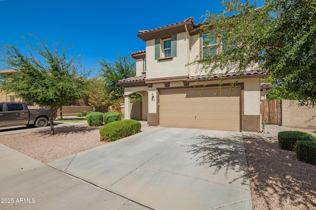 263 N Wilson Dr, Chandler, AZ 85225 - mediterranean / spanish house featuring stucco siding, concrete driveway, a tiled roof, and an attached garage